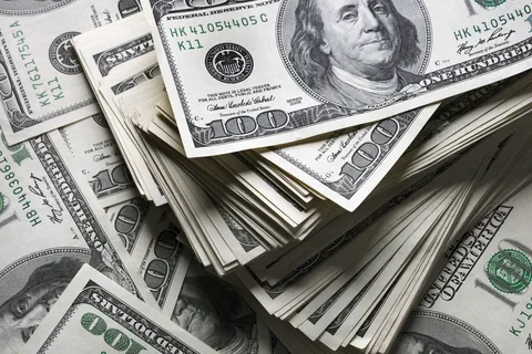 A spread out stack of hundred dollar bills.