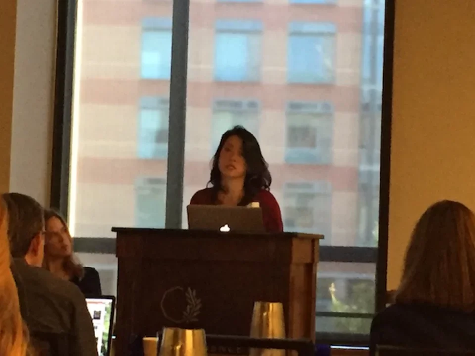 Woman speaking at podium during 2016 CDMD Retreat